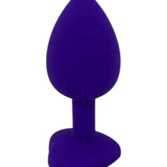 Plug anal Gema Bright de silicón suave con gema redonda, disponible en negro y rosa neón, diseño brillante de Glow & Vibe.
