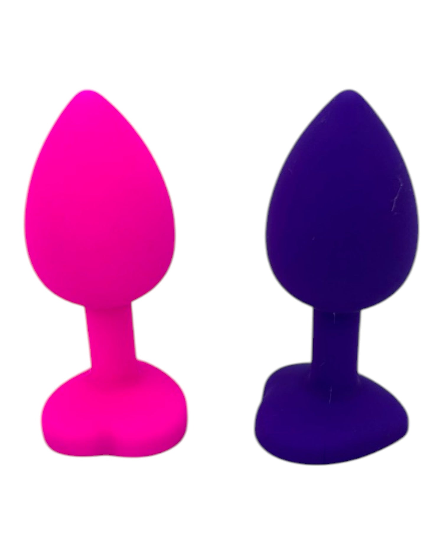 Plug anal Gema Bright de silicón suave con gema redonda, disponible en negro y rosa neón, diseño brillante de Glow & Vibe.