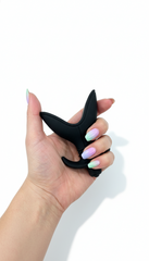 Plug anal Booty Blast de silicón suave con 10 funciones de vibración, diseño ergonómico y potente de Glow & Vibe.