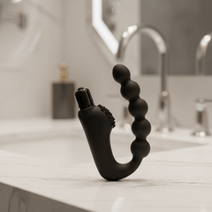 Plug anal Power Beads de silicón suave con esferas y 10 funciones de vibración, diseño sofisticado Glow & Vibe.