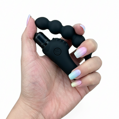 Plug anal Power Beads de silicón suave con esferas y 10 funciones de vibración, diseño sofisticado Glow & Vibe.