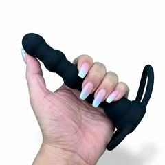 Plug anal Rock Beads de silicón suave con diseño de esfera y vibración sencilla, accesorio práctico Glow & Vibe.