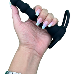Plug anal Rock Beads de silicón suave con diseño de esfera y vibración sencilla, accesorio práctico Glow & Vibe.
