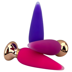 Dilatador anal Pearl Nature de silicón suave con 10 funciones de vibración, diseño elegante y natural de Glow & Vibe.