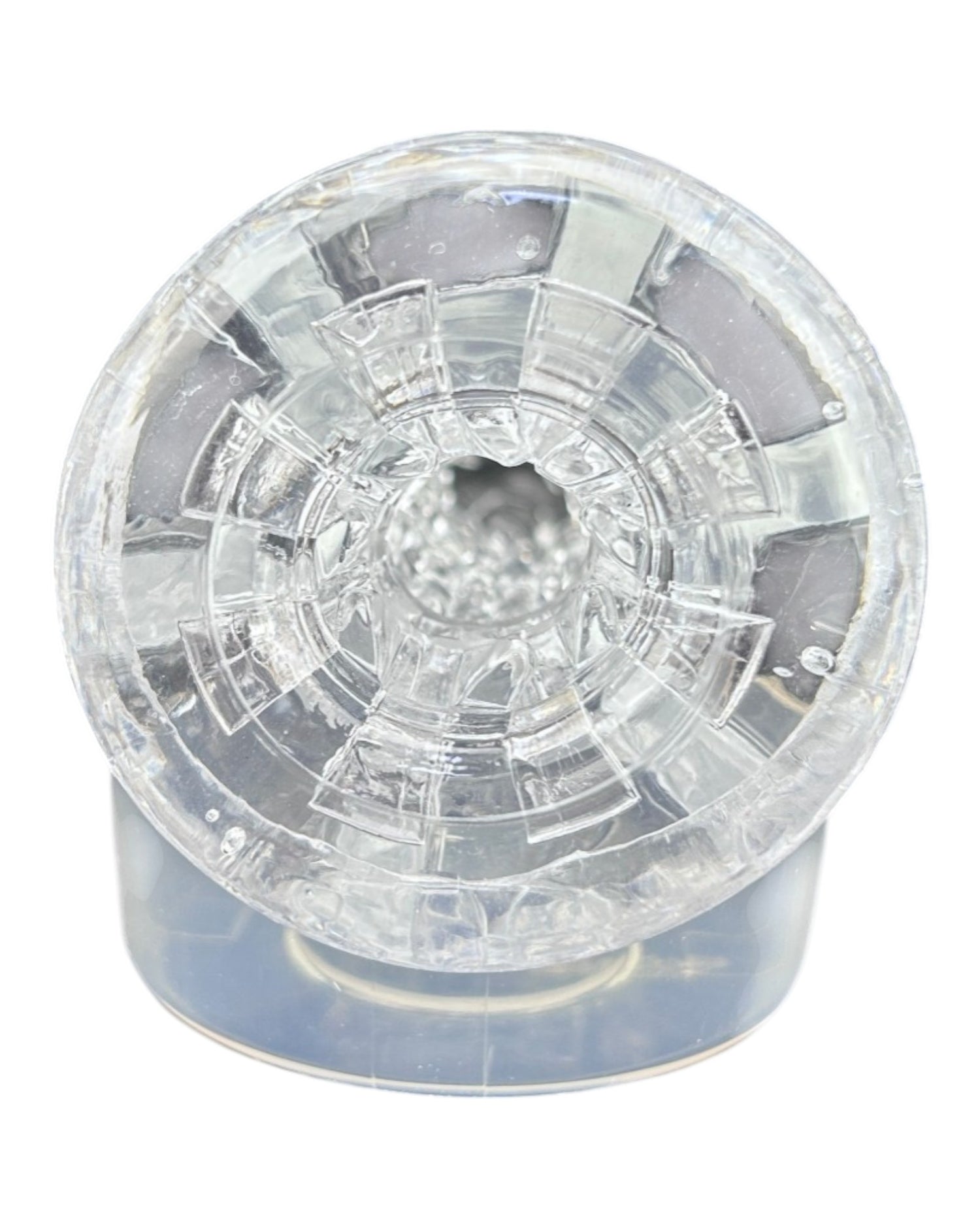 Masturbador Big Bang de silicón flexible con textura interna y efecto de succión, diseño compacto de Glow & Vibe.