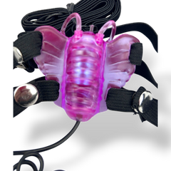 Masturbador femenino Butterfly Bliss de gel lavanda con diseño de mariposa y vibración gradual, Glow & Vibe.