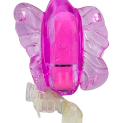 Estimulador femenino Butterfly Glow en forma de mariposa con vibración, diseño compacto y rosa brillante Glow & Vibe.
