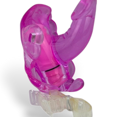 Estimulador femenino Butterfly Glow en forma de mariposa con vibración, diseño compacto y rosa brillante Glow & Vibe.