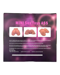 Masturbador Hot Mini doble (vaginal y anal) con textura Magic Flesh, tamaño compacto y vibración ligera Glow & Vibe.