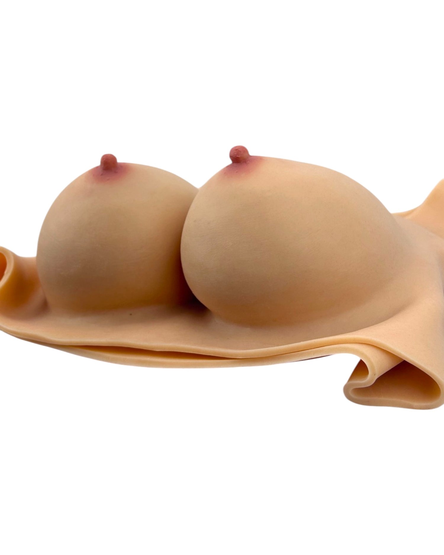 Prótesis de senos Soft Bust de silicón flexible con relleno de algodón, textura realista y diseño ergonómico Glow & Vibe.