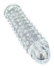 Funda Clear Extender de gel transparente con textura y vibración, silicón suave y diseño realista Glow & Vibe.