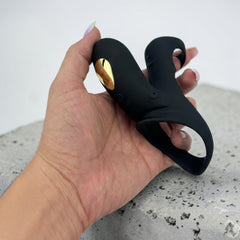 Media funda Dual Pulse de silicón con doble aro, estimulador clitoral y vibración Glow & Vibe.