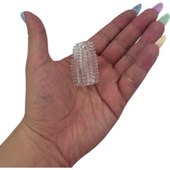 Crystal Grip Sleeve Glow & Vibe funda texturizada transparente con relieves y anillos para mayor estimulación.