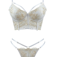 Conjunto de lencería Glow&Vibe Obsidian Desire blanco con bustier de encaje, transparencias y tiras ajustables.