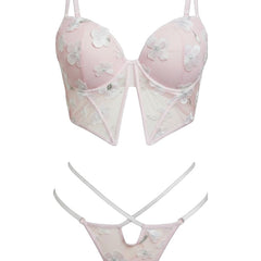 Conjunto de lencería Glow&Vibe Blush Temptation rosa con encaje floral blanco, bustier estructurado y tanga de tiras.