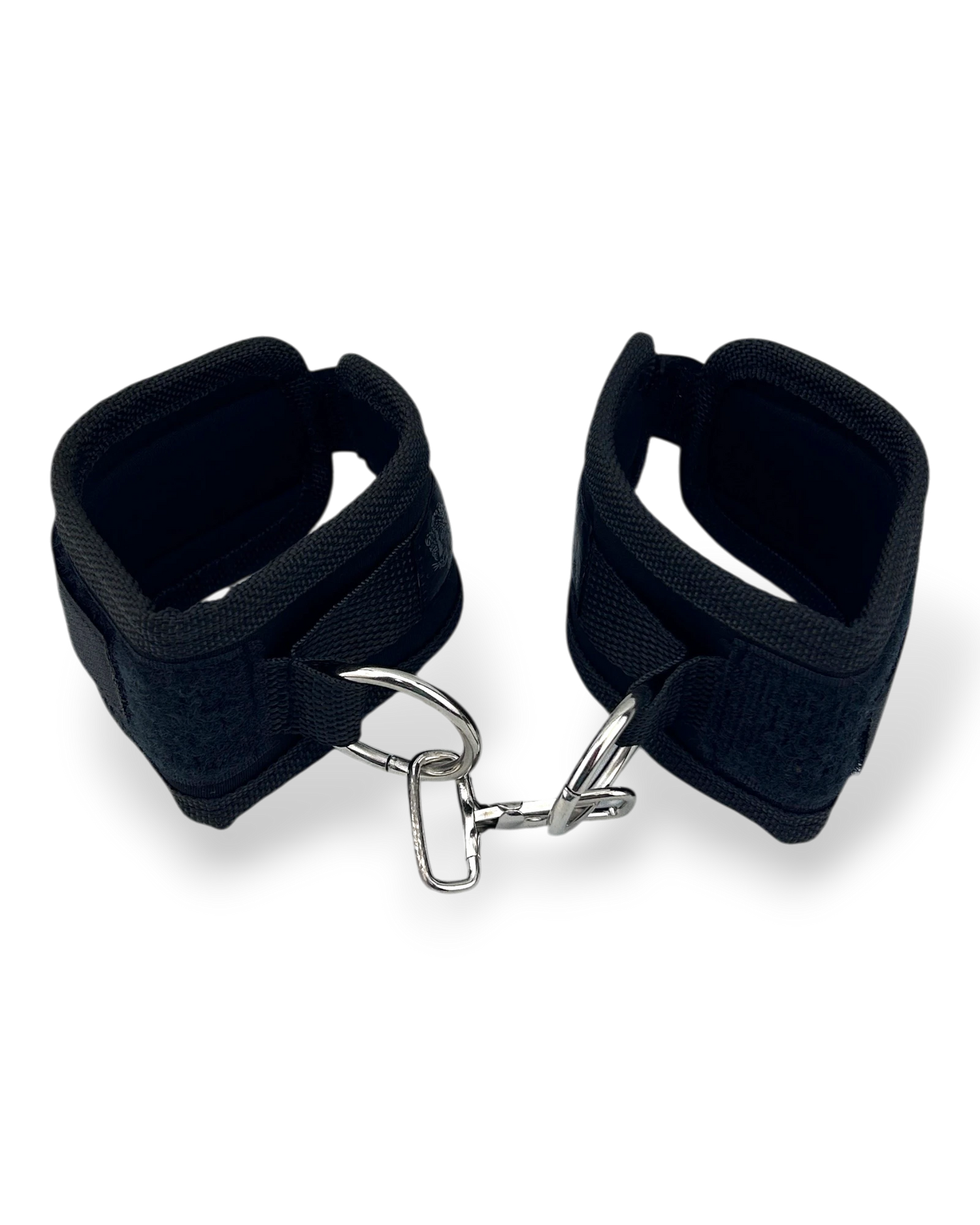 Glow & Vibe esposas de velcro negras con cadena metálica, ajustables y cómodas para juegos de sumisión.
