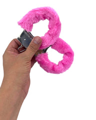 Esposas de peluche rosa de Glow&Vibe con cubierta de felpa extraíble y detalles metálicos.
