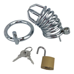 Jaula de pene de metal pulido Glow&Vibe con aro para testículos y candado con llave. Acero resistente para control y sumisión.