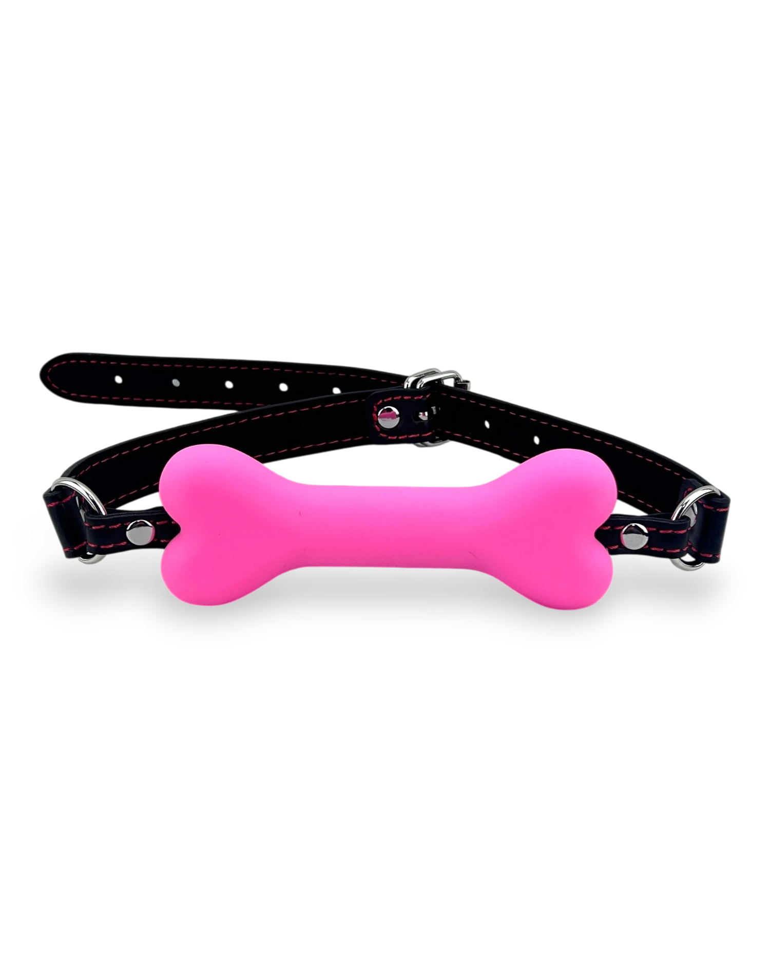 Glow&Vibe mordaza bucal rosa con forma de hueso de plástico suave y cinturón de cuero sintético negro.