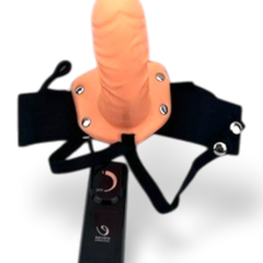 Arnés de strap-on Glow&Vibe de color negro y melocotón con funda realista y control de vibración por cable.