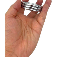 Triple anillo Titan Ring de acero para control, potencia y resistencia Glow & Vibe.