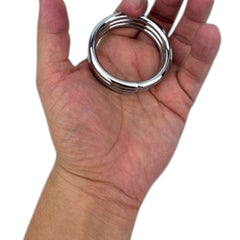 Triple anillo Titan Ring de acero para control, potencia y resistencia Glow & Vibe.