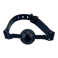 Glow&Vibe Aphro Gag mordaza bucal negra de cuero sintético con pelota rígida perforada de 4 cm.