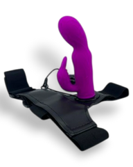 Arnés negro ajustable de Glow&Vibe con dildo de silicona morado texturizado y estimulador de clítoris integrado.