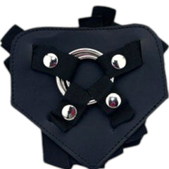 Arnés Triple Control de Glow&Vibe en nylon negro con triple anillo metálico y tiras ajustables para sujeción segura.