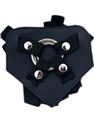 Arnés Triple Control de Glow&Vibe en nylon negro con triple anillo metálico y tiras ajustables para sujeción segura.