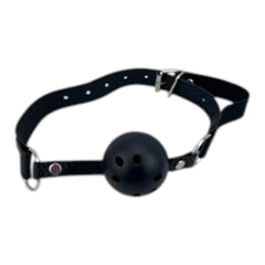 Glow&Vibe Fetish Glow Kit mordaza negra con correa ajustable y bola con agujeros para juego SADO.