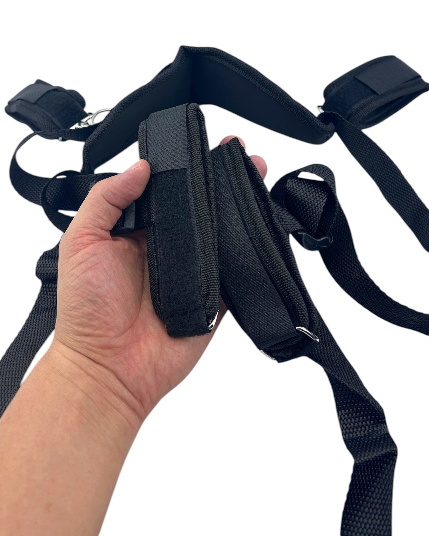 Arnés Hogtie Desire negro de velcro de Glow&Vibe con esposas para manos y pies y soporte de cuello.