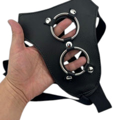 Arnés negro de nailon de Glow&Vibe con doble anillo metálico y tiras ajustables para un control total.
