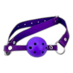 Glow&Vibe Kit de bondage morado con mordaza de bola con agujeros y correas ajustables.
