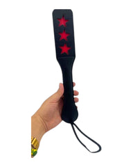 Paleta de azotes Glow&Vibe de cuero sintético negro con recortes de estrellas rojas, 32.5cm