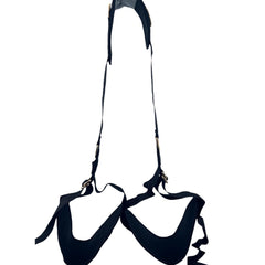 Glow&Vibe Straddle Bound negro ajustable con soporte para cuello y piernas, correas acolchadas y anillos dorados.