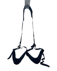 Glow&Vibe Straddle Bound negro ajustable con soporte para cuello y piernas, correas acolchadas y anillos dorados.