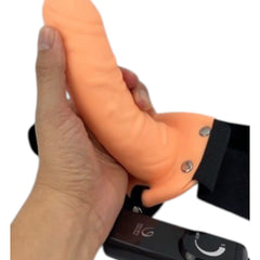 Alias Strap-On con vibrador realista y arnés ajustable Glow & Vibe.